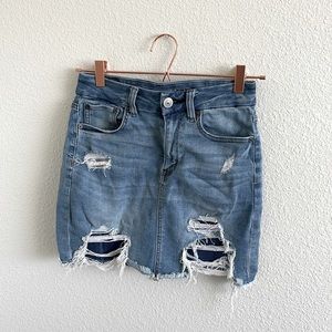 Ripped denim mini skirt
